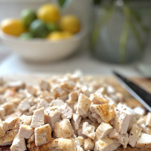 Oven roasted chicken breast cut into even diced pieces